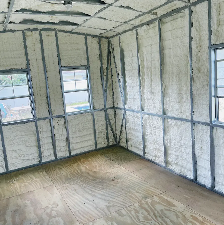 Closed-cell spray foam insulation applied to wall cavities in a residential project in Rice Lake